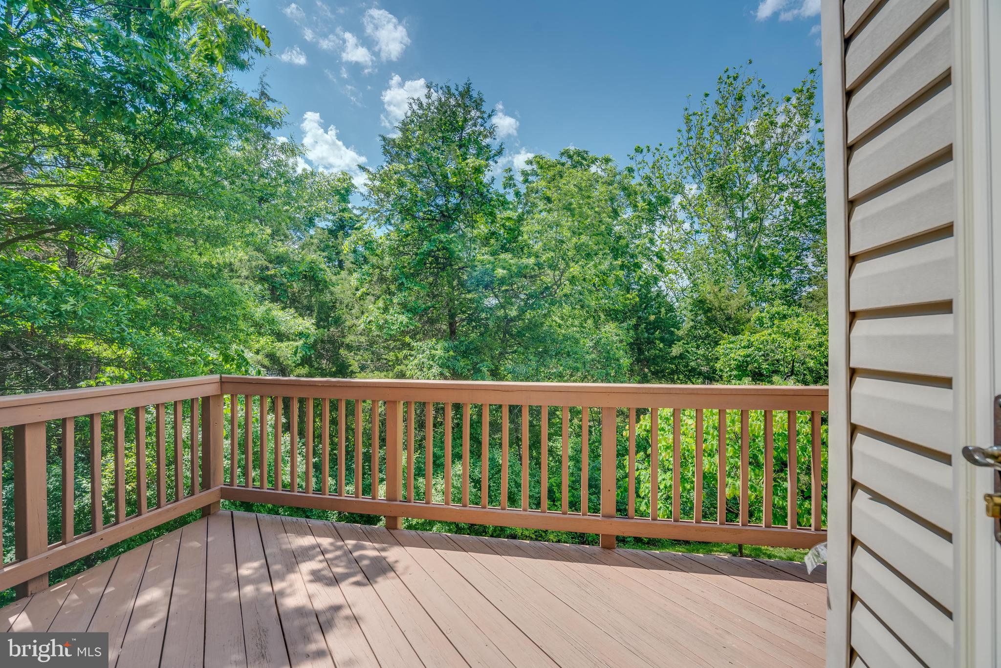 13641 Cedar Run Lane Herndon, VA 20171 - Photo 23 of 56 a view of a wooden deck
