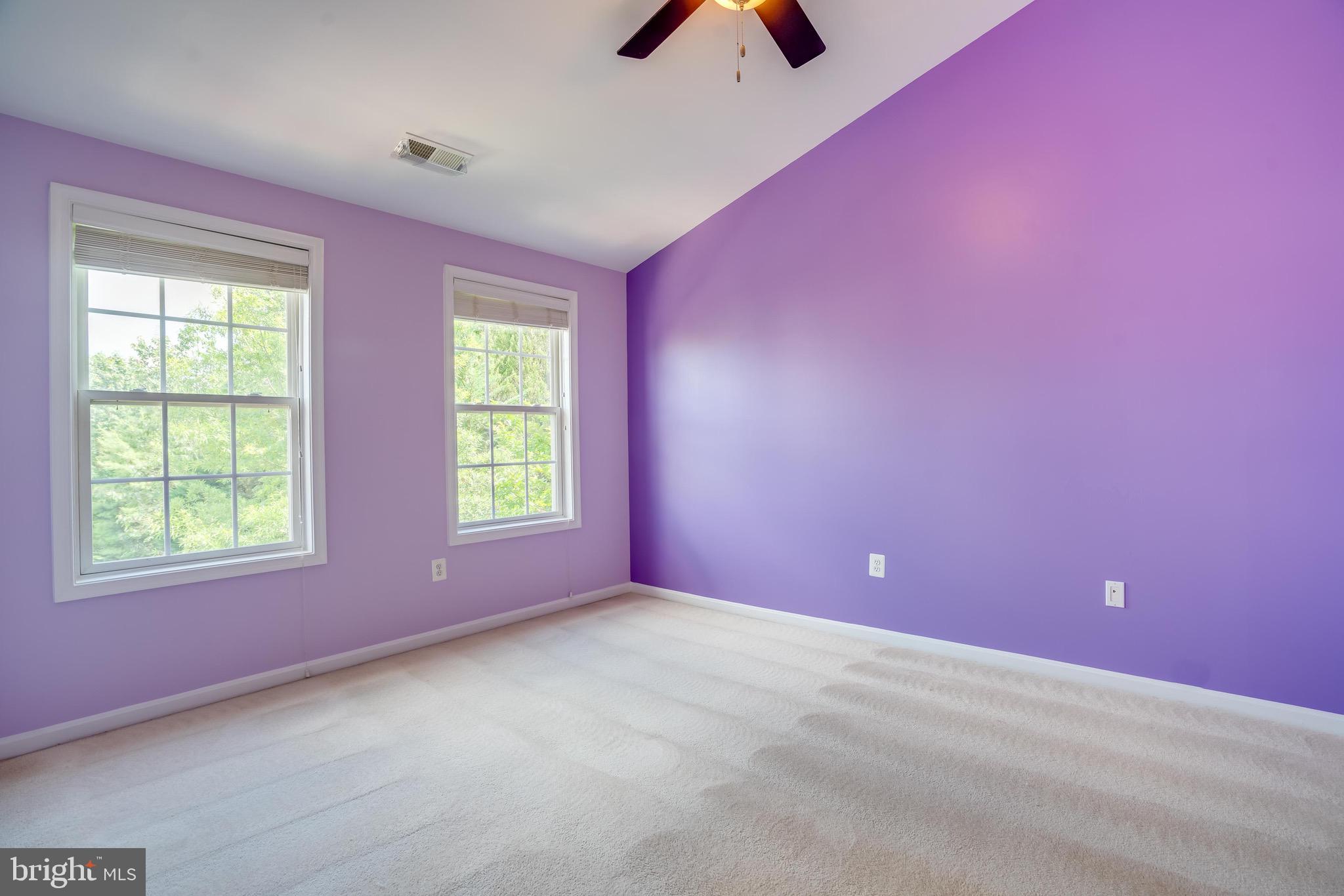 13641 Cedar Run Lane Herndon, VA 20171 - Photo 29 of 56 an empty room with windows and ceiling fan
