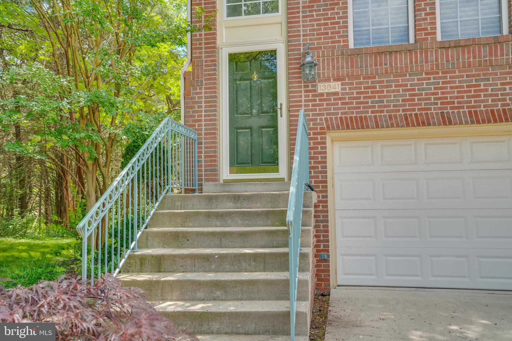 13641 Cedar Run Lane Herndon, VA 20171 - Photo 4 of 56 a view of wooden house with a yard