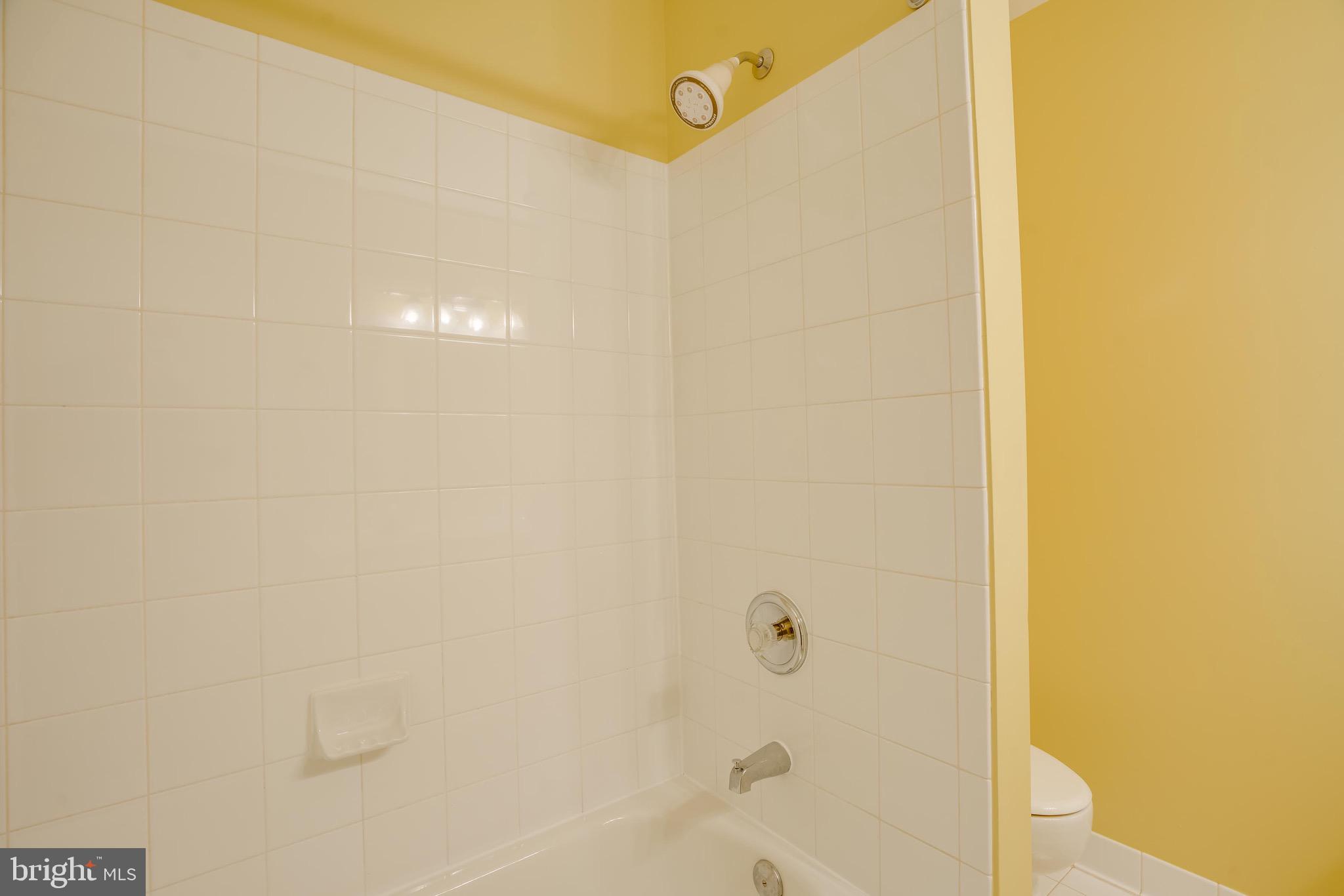 13641 Cedar Run Lane Herndon, VA 20171 - Photo 33 of 56 a bathroom with a shower