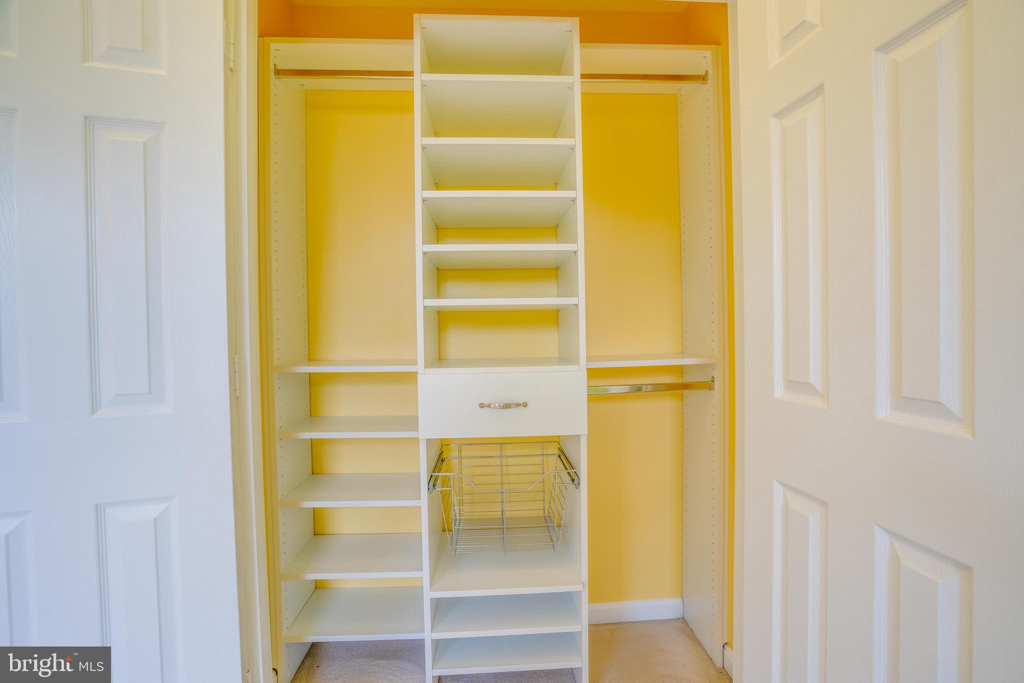 13641 Cedar Run Lane Herndon, VA 20171 - Photo 36 of 56 a view of walk in closet with empty racks