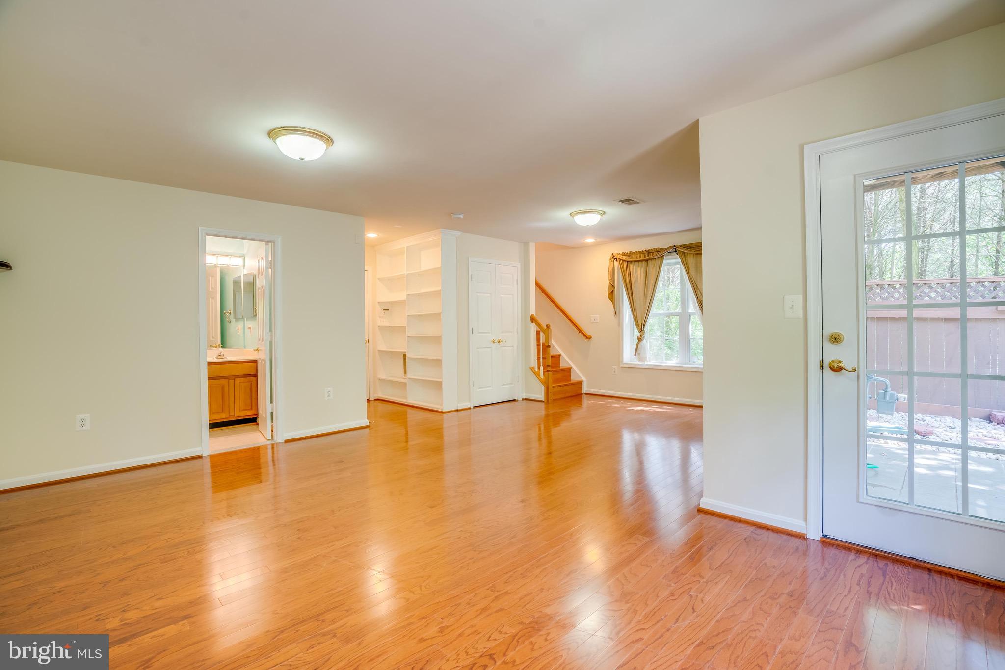 13641 Cedar Run Lane Herndon, VA 20171 - Photo 46 of 56 wooden floor in an empty room with a window