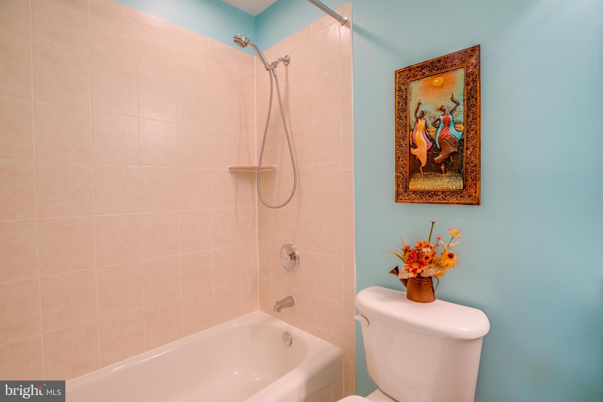 13641 Cedar Run Lane Herndon, VA 20171 - Photo 49 of 56 a bathroom with a toilet sink and tub