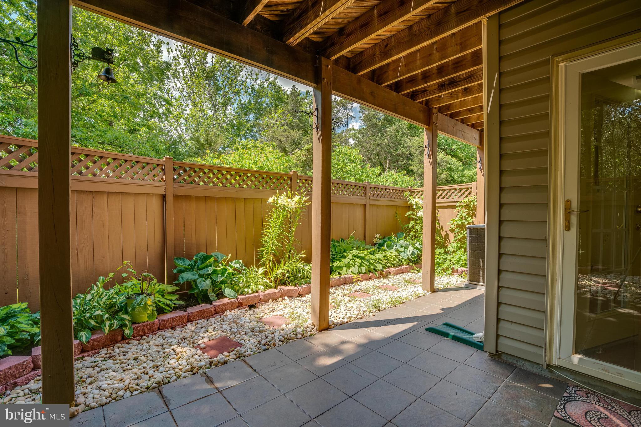 13641 Cedar Run Lane Herndon, VA 20171 - Photo 51 of 56 a view of a backyard with garden