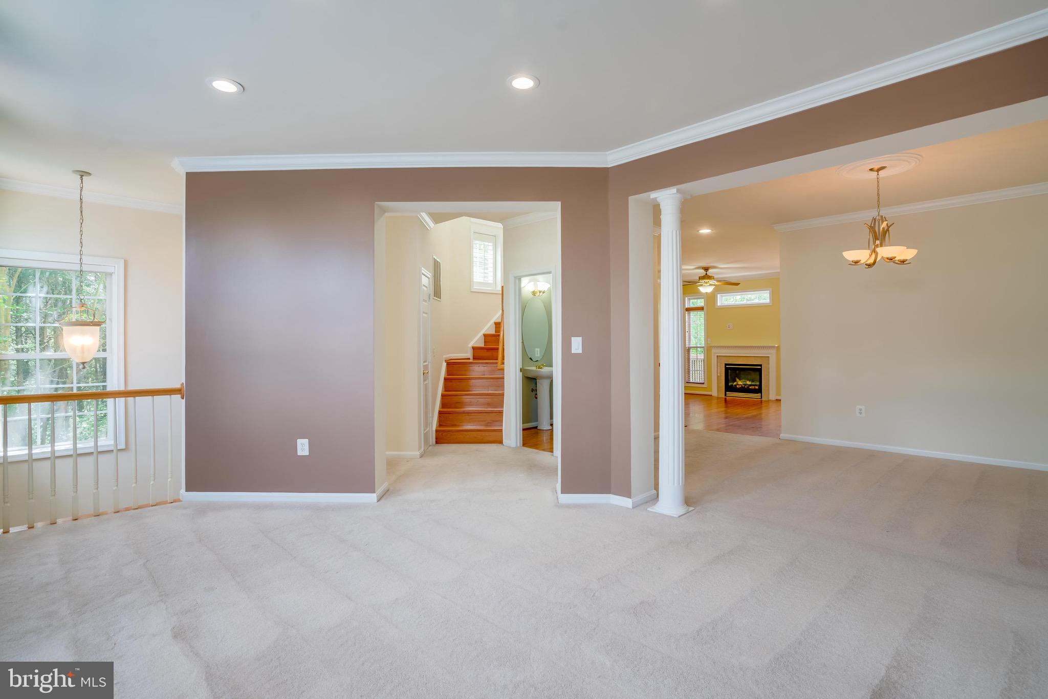 13641 Cedar Run Lane Herndon, VA 20171 - Photo 8 of 56 an empty room with fan and entrance