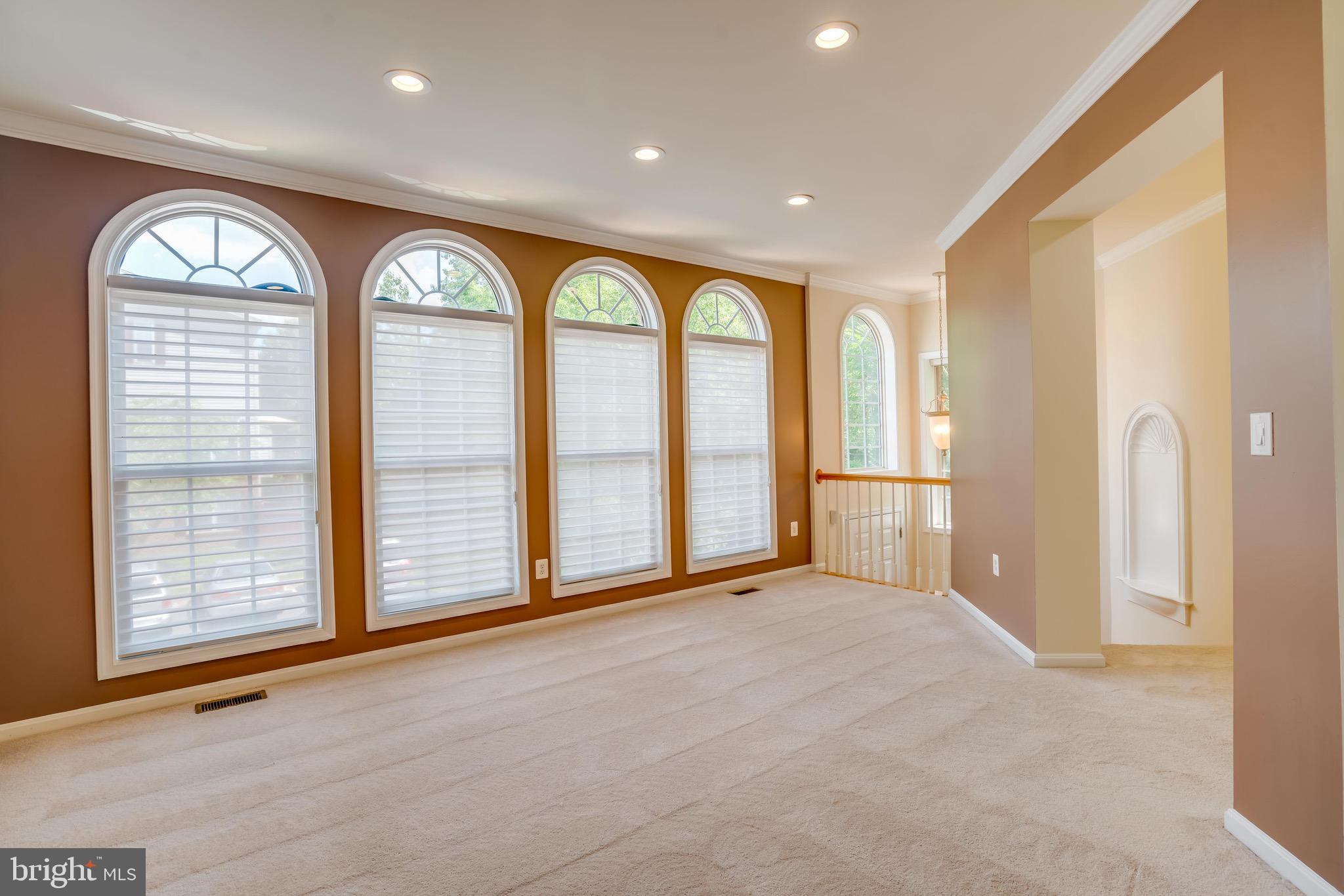 13641 Cedar Run Lane Herndon, VA 20171 - Photo 9 of 56 a view of an empty room with a window