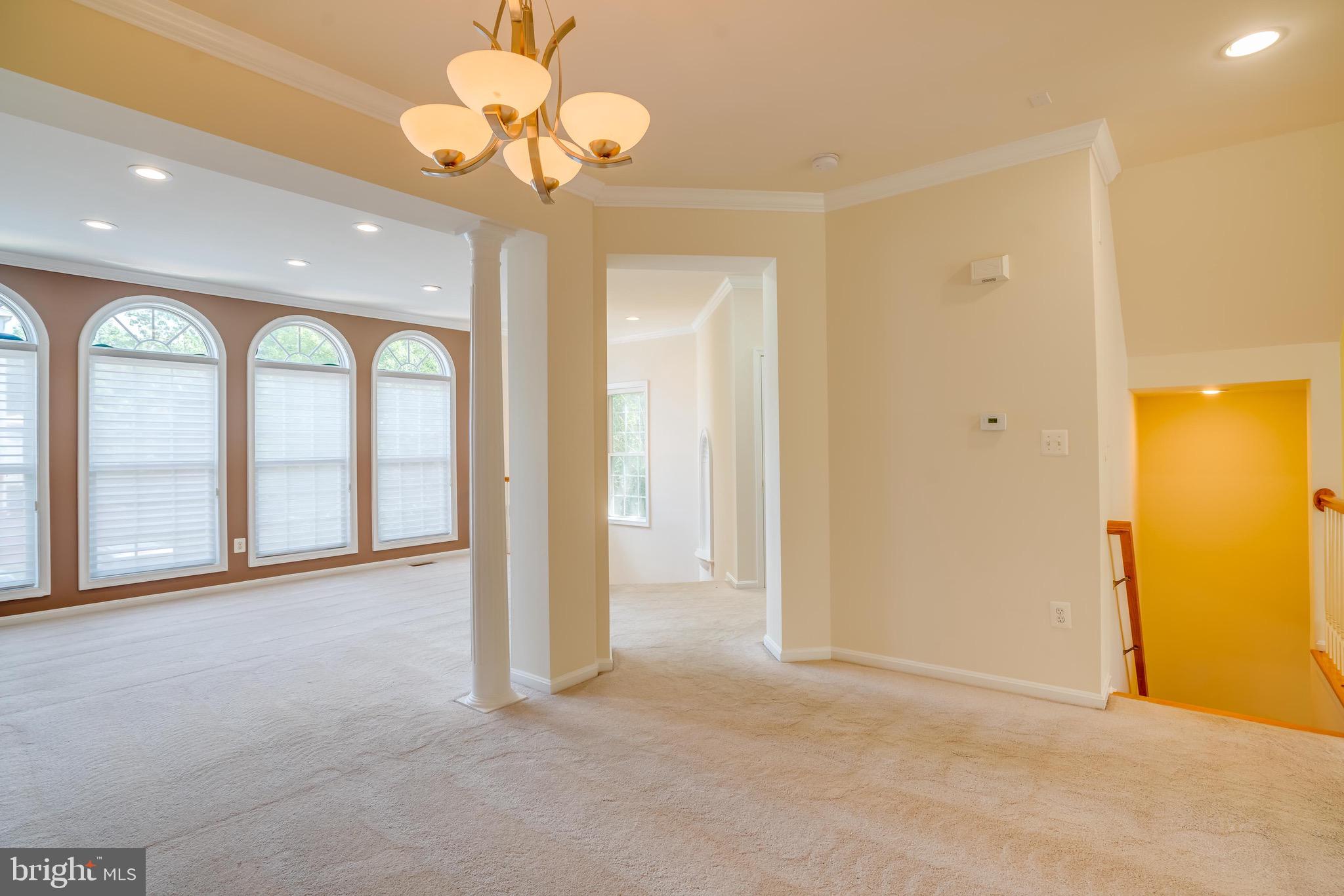 13641 Cedar Run Lane Herndon, VA 20171 - Photo 10 of 56 a view of an empty room with a window