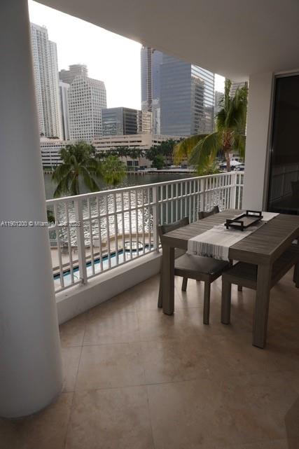 701 Brickell Key Boulevard, Unit 412 Miami, FL 33131 - Photo 18 of 37 a view of balcony with a couple of chairs