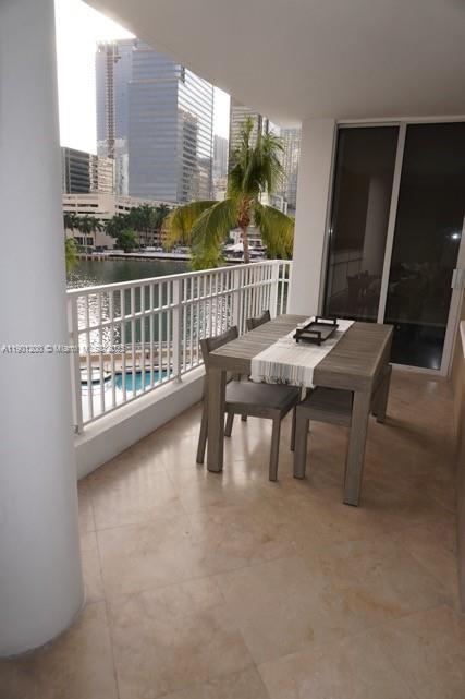701 Brickell Key Boulevard, Unit 412 Miami, FL 33131 - Photo 23 of 37 a view of a balcony with chairs