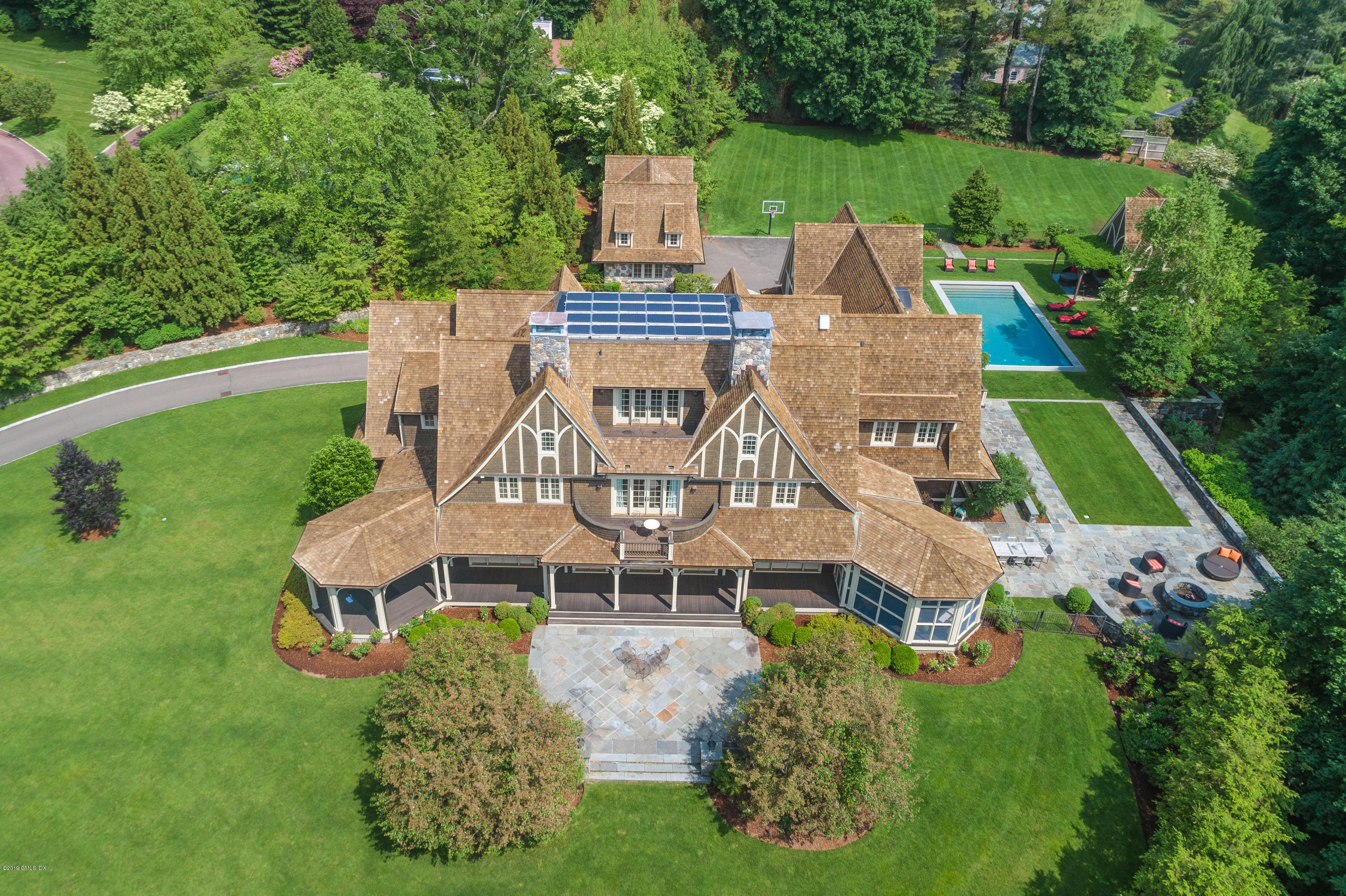 an aerial view of a house with a garden