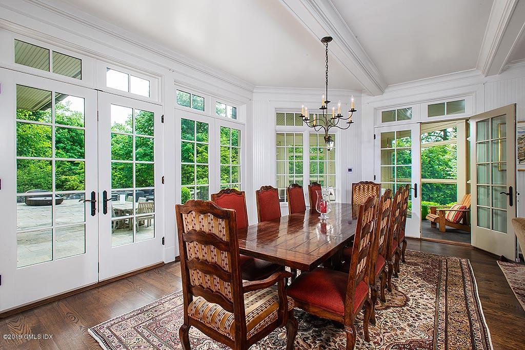 16 Doubling Road Greenwich, CT 06830 - Photo 14 of 45 a view of a dining room with furniture window and outside view