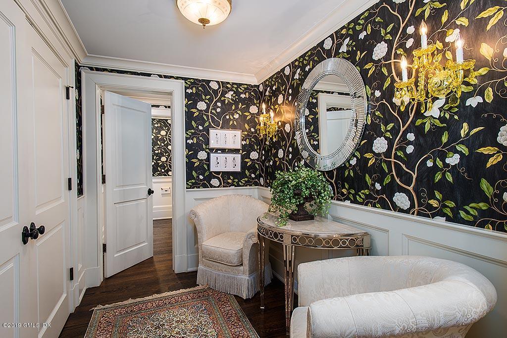 16 Doubling Road Greenwich, CT 06830 - Photo 19 of 45 a living room with furniture and a potted plant