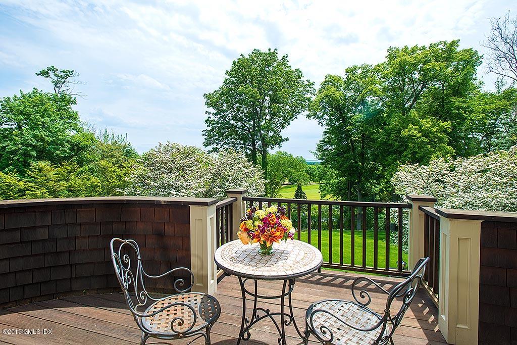 16 Doubling Road Greenwich, CT 06830 - Photo 26 of 45 a view of a chairs and table in patio