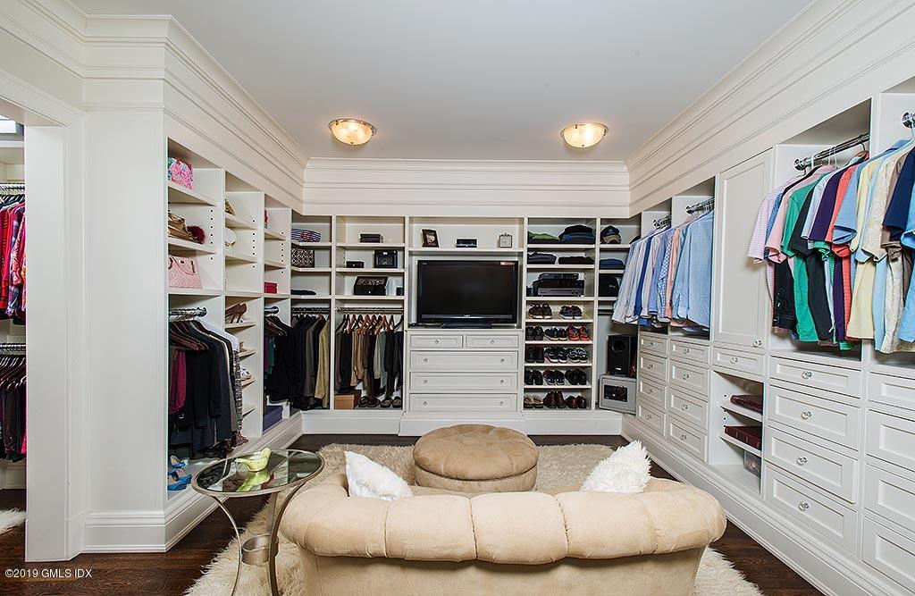 16 Doubling Road Greenwich, CT 06830 - Photo 28 of 45 a room with lots of furniture and closet