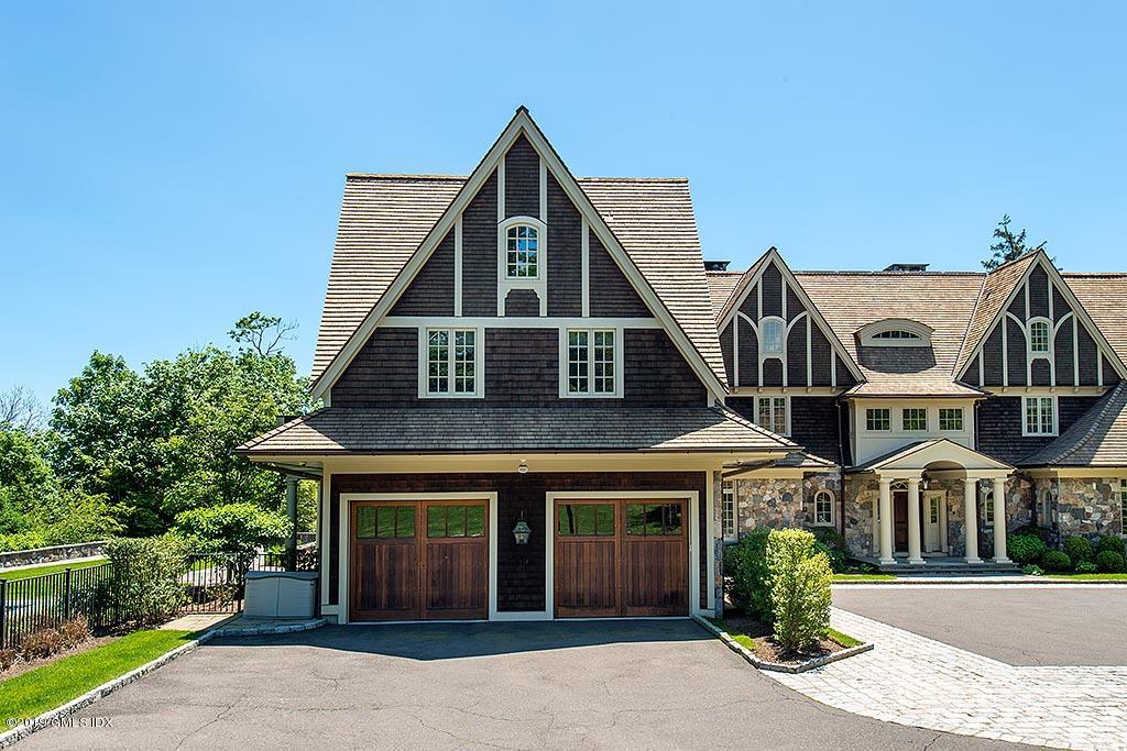 16 Doubling Road Greenwich, CT 06830 - Photo 44 of 45 a front view of a house with a yard
