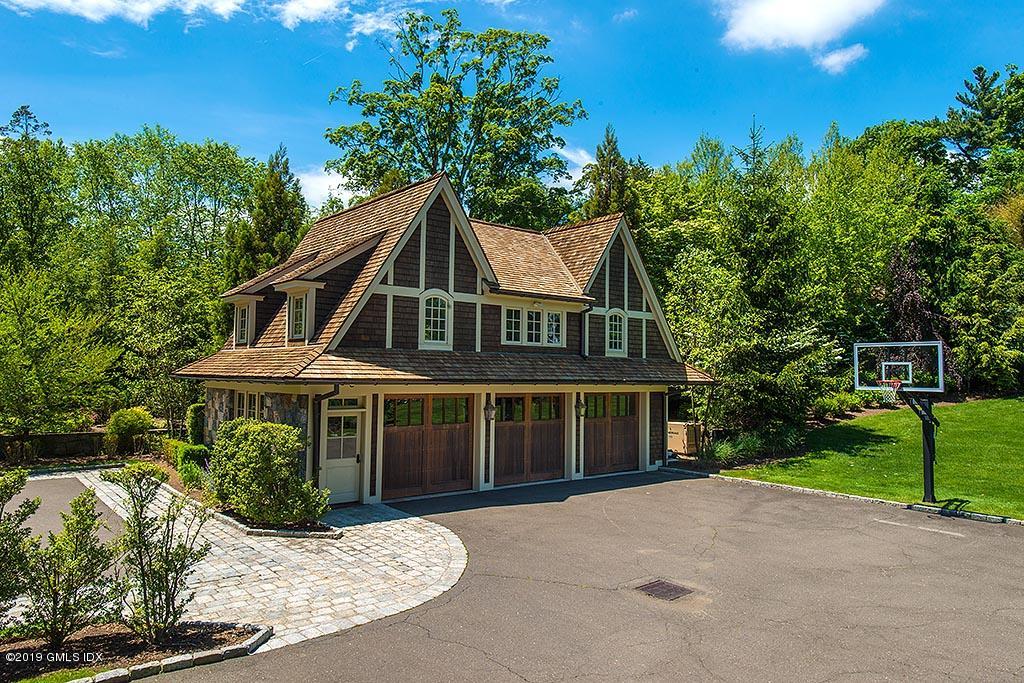 16 Doubling Road Greenwich, CT 06830 - Photo 45 of 45 a front view of a house with a yard