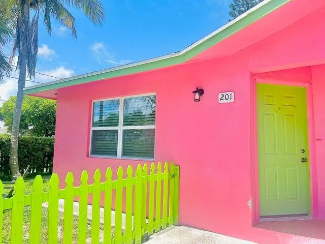 a view of a pool with a small yard