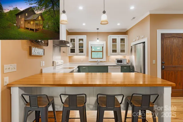 a view of kitchen island dining table and chairs
