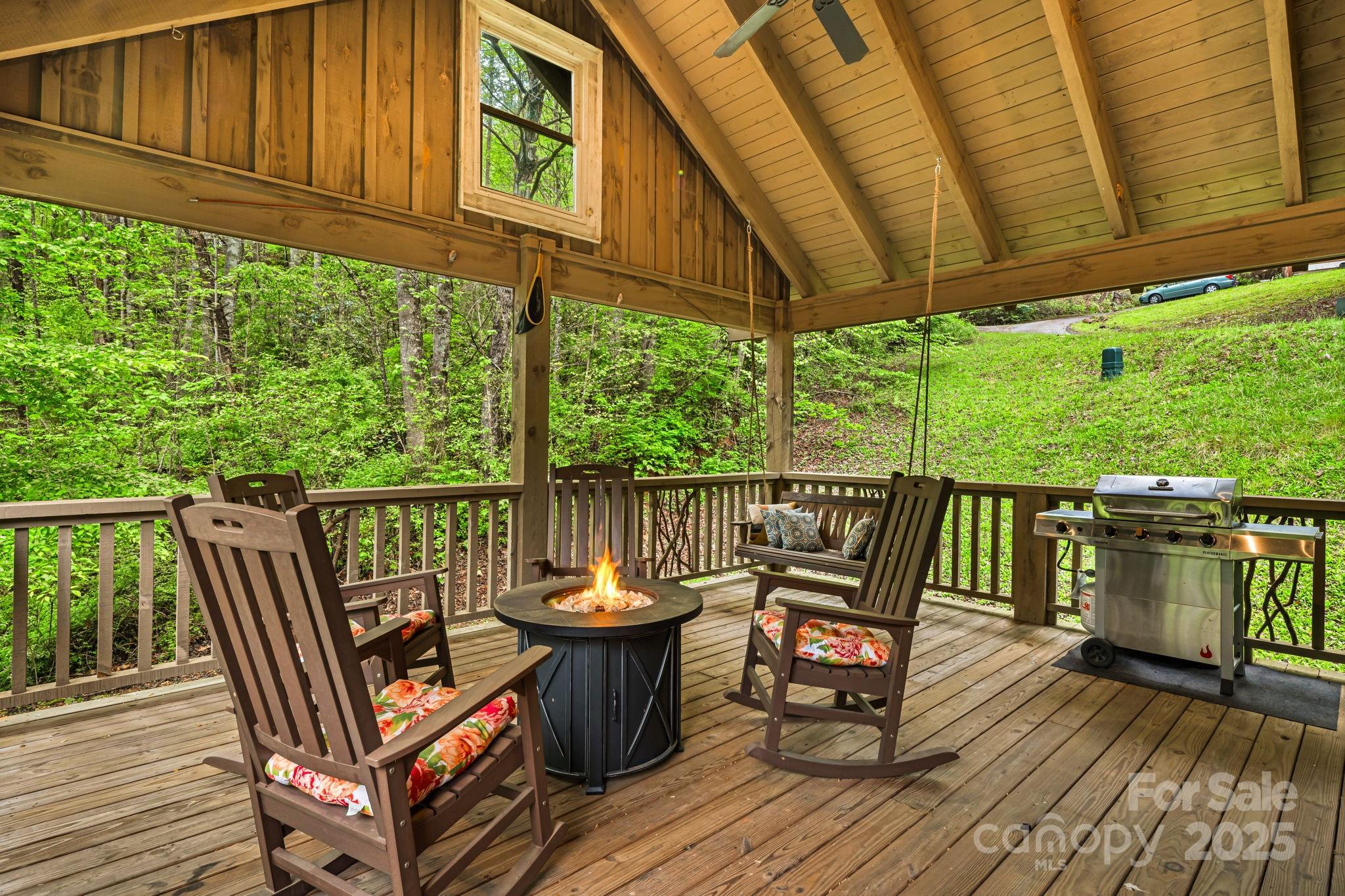 79 Slumber Lane Sylva, NC 28779 - Photo 18 of 29 a view of a two chairs in the deck