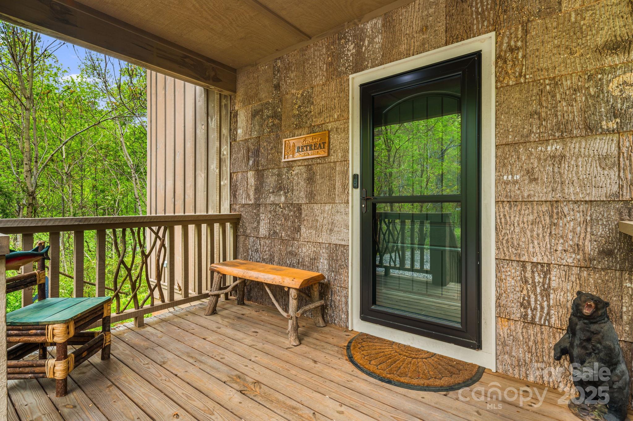 79 Slumber Lane Sylva, NC 28779 - Photo 3 of 29 a house view with a seating space