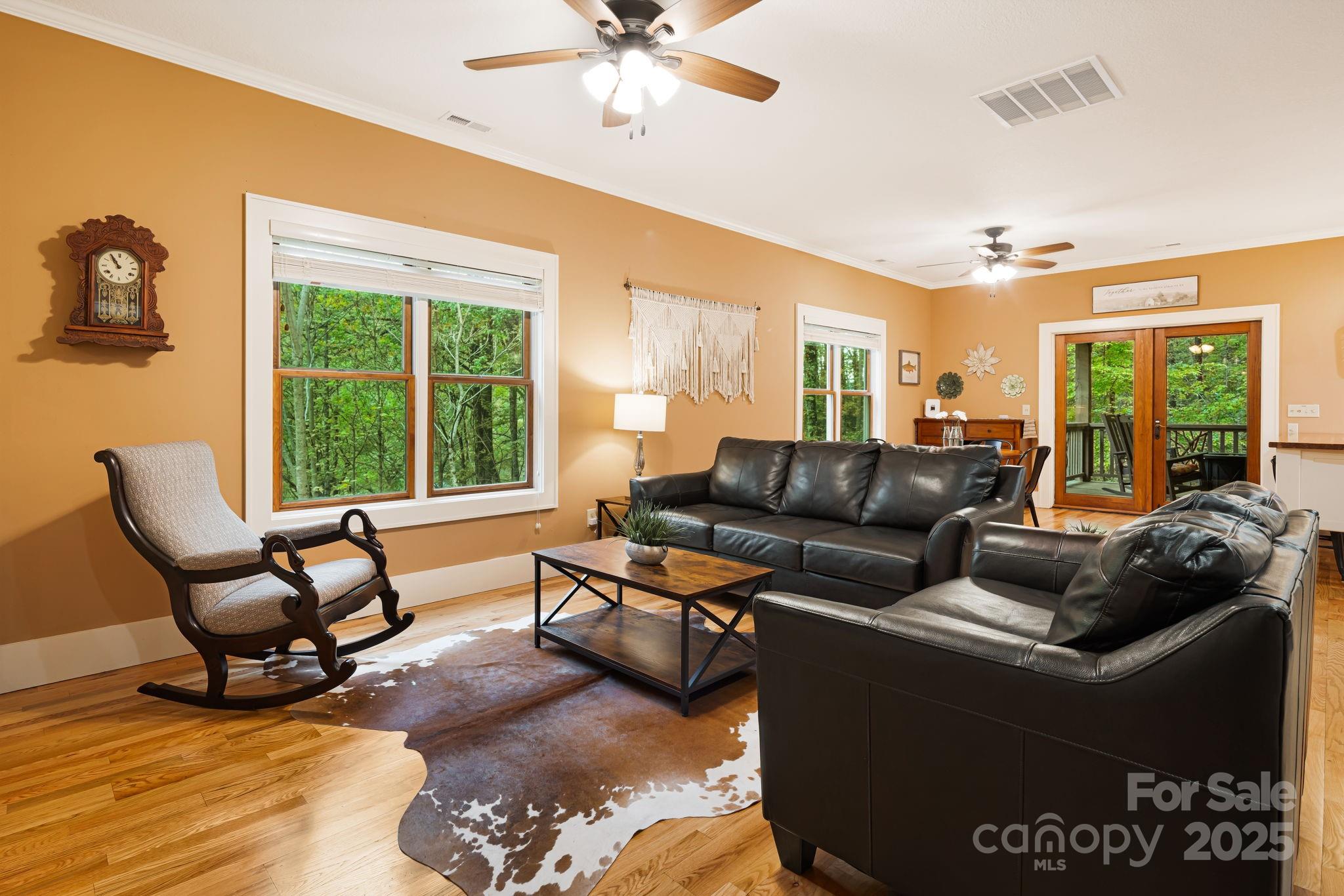 79 Slumber Lane Sylva, NC 28779 - Photo 5 of 29 a living room with furniture and a large window