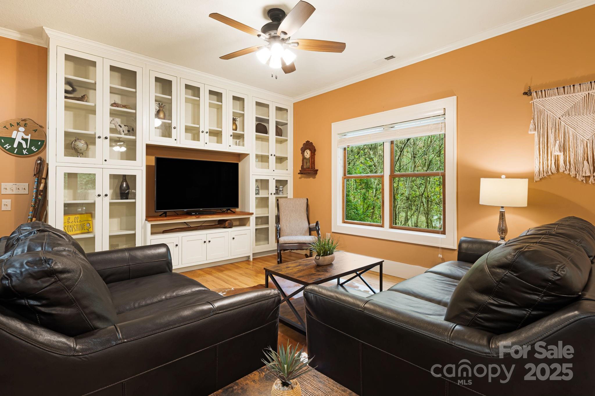 79 Slumber Lane Sylva, NC 28779 - Photo 7 of 29 a living room with furniture and a flat screen tv