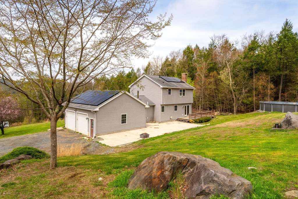 574 Main Road Chesterfield, MA 01012 - Photo 7 of 42 a view of a house with a yard