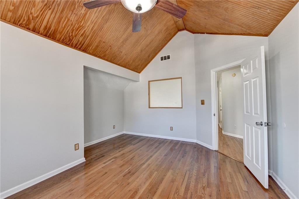 1112 Ashbury Drive Decatur, GA 30030 - Photo 38 of 64 a view of an empty room with wooden floor