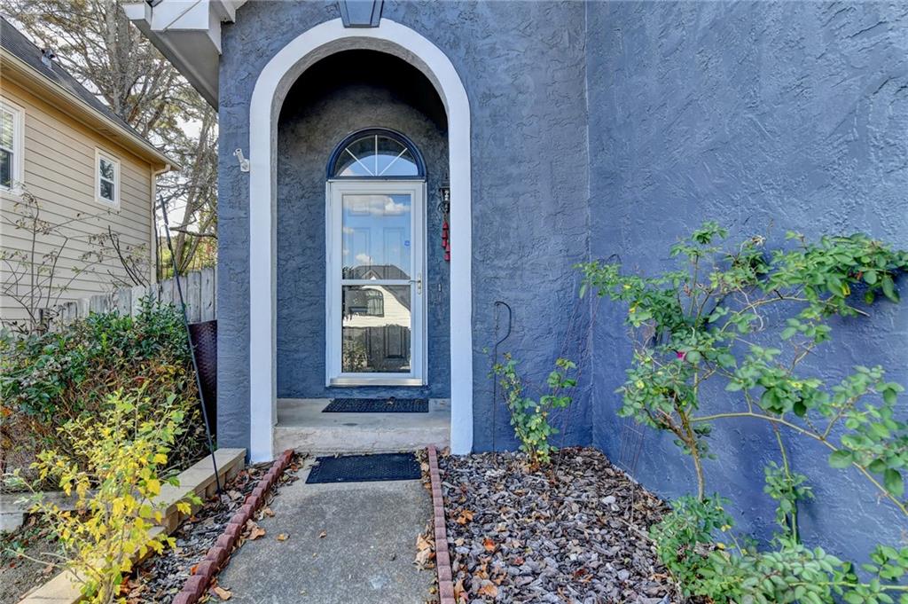 1112 Ashbury Drive Decatur, GA 30030 - Photo 5 of 64 a front view of a house with garden