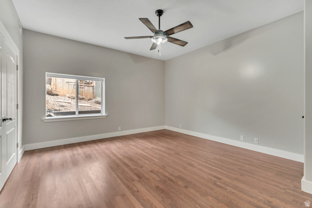 2154 Wasatch Boulevard Sandy, UT 84092 - Photo 36 of 55 Empty room with light wood-type flooring and a ceiling fan