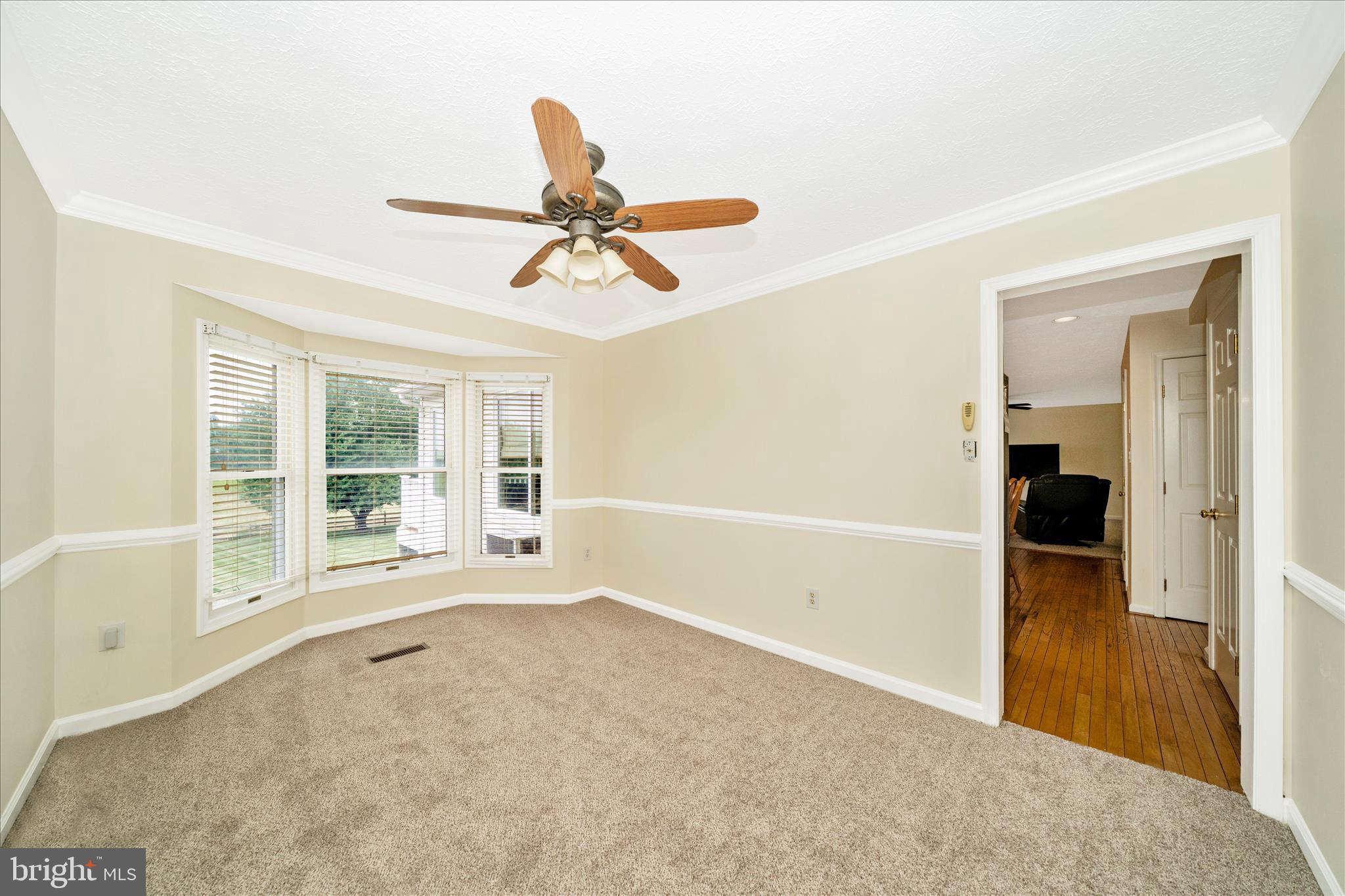 9534 Liberty Road Frederick, MD 21701 - Photo 13 of 70 an empty room with fan and a window
