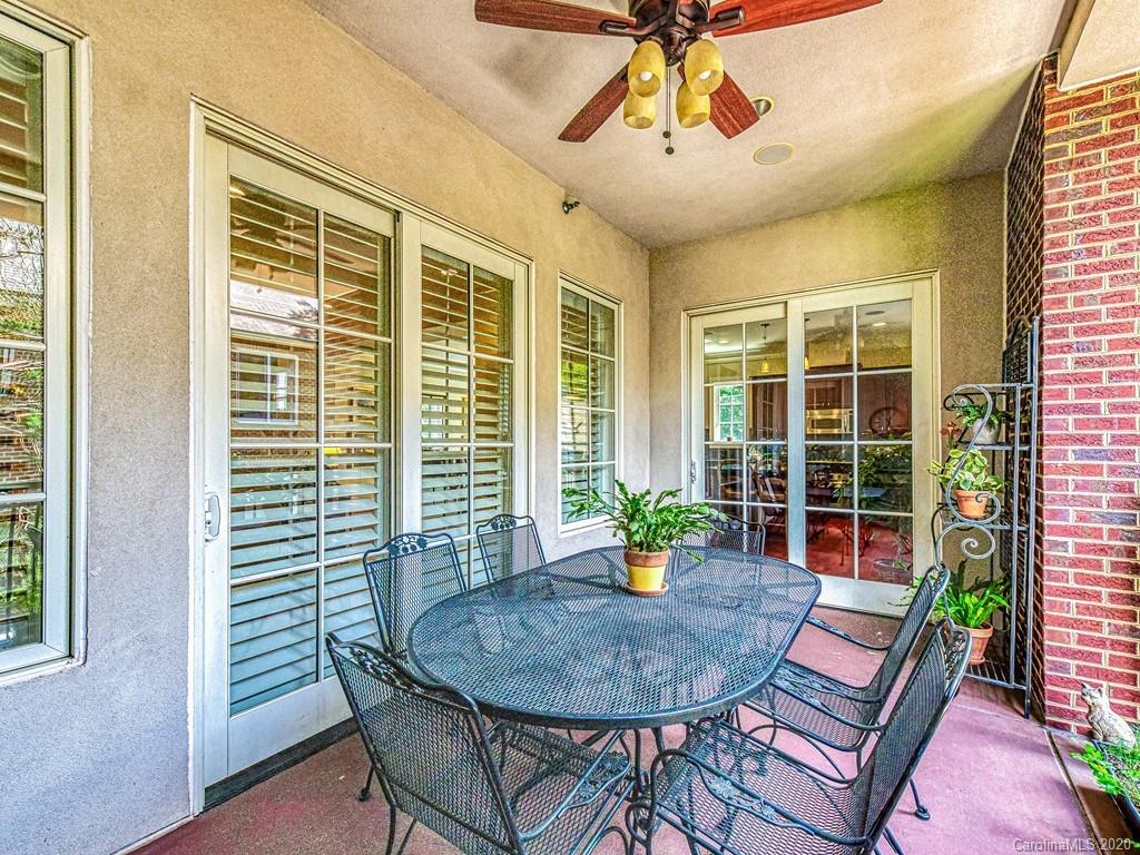 2223 Croydon Road, Unit 204 Charlotte, NC 28207 - Photo 25 of 27 a dining room with a table and chairs