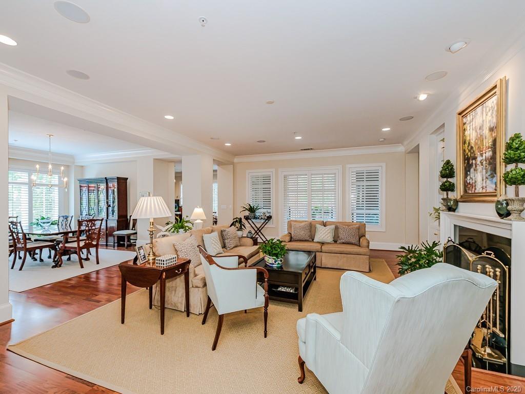 2223 Croydon Road, Unit 204 Charlotte, NC 28207 - Photo 5 of 27 a living room with furniture and a large window