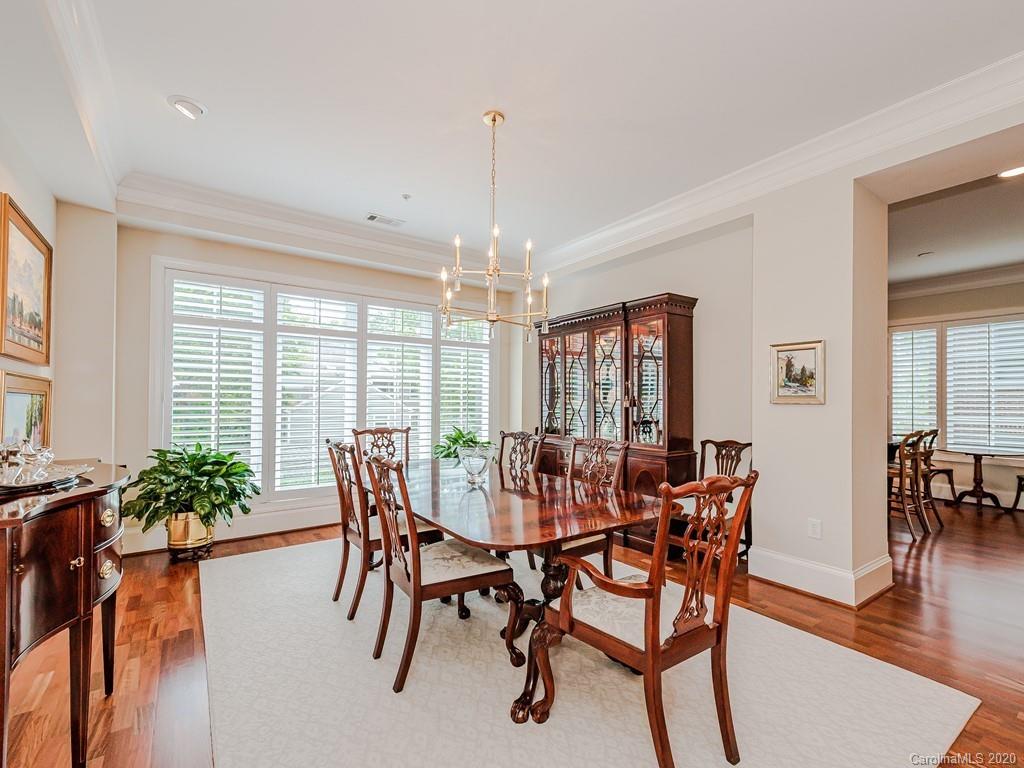 2223 Croydon Road, Unit 204 Charlotte, NC 28207 - Photo 10 of 27 a view of a dining room with furniture window and wooden floor