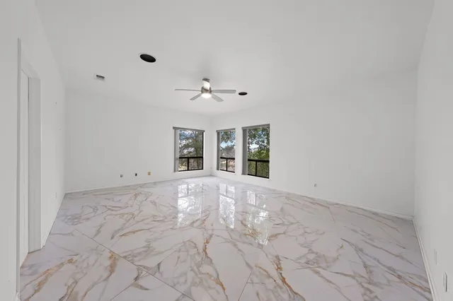 a view of a large window with an outdoor space