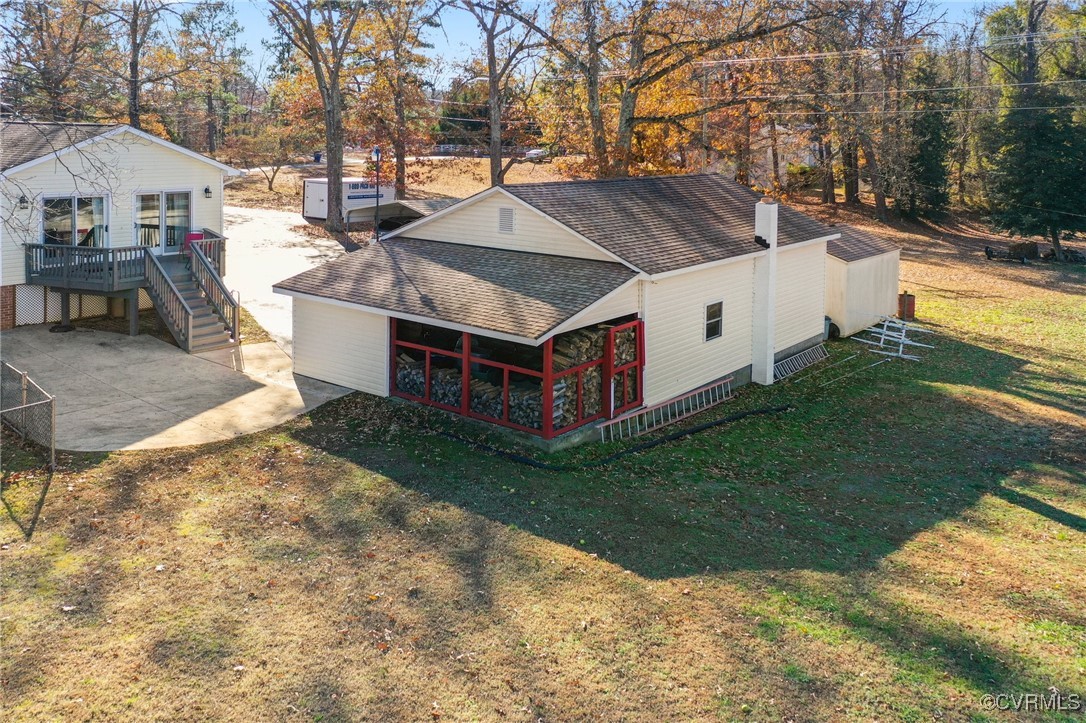 5428 West Hundred Road Chester, VA 23831 - Photo 3 of 48 a view of a house with backyard and sitting area