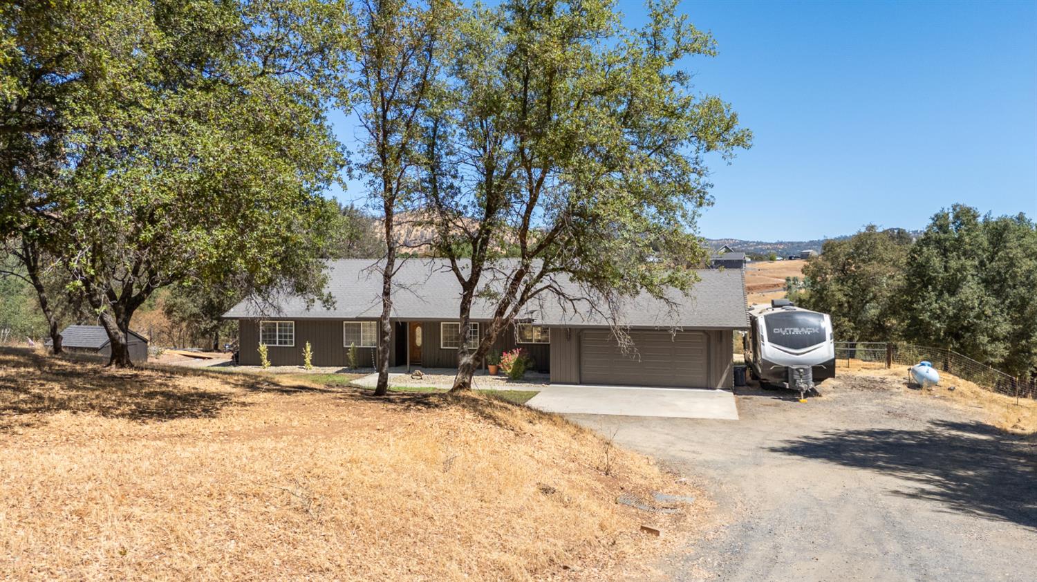 2384 Choctaw Road Copperopolis, CA 95228 - Photo 1 of 53 a view of swimming pool with lawn chairs and plants