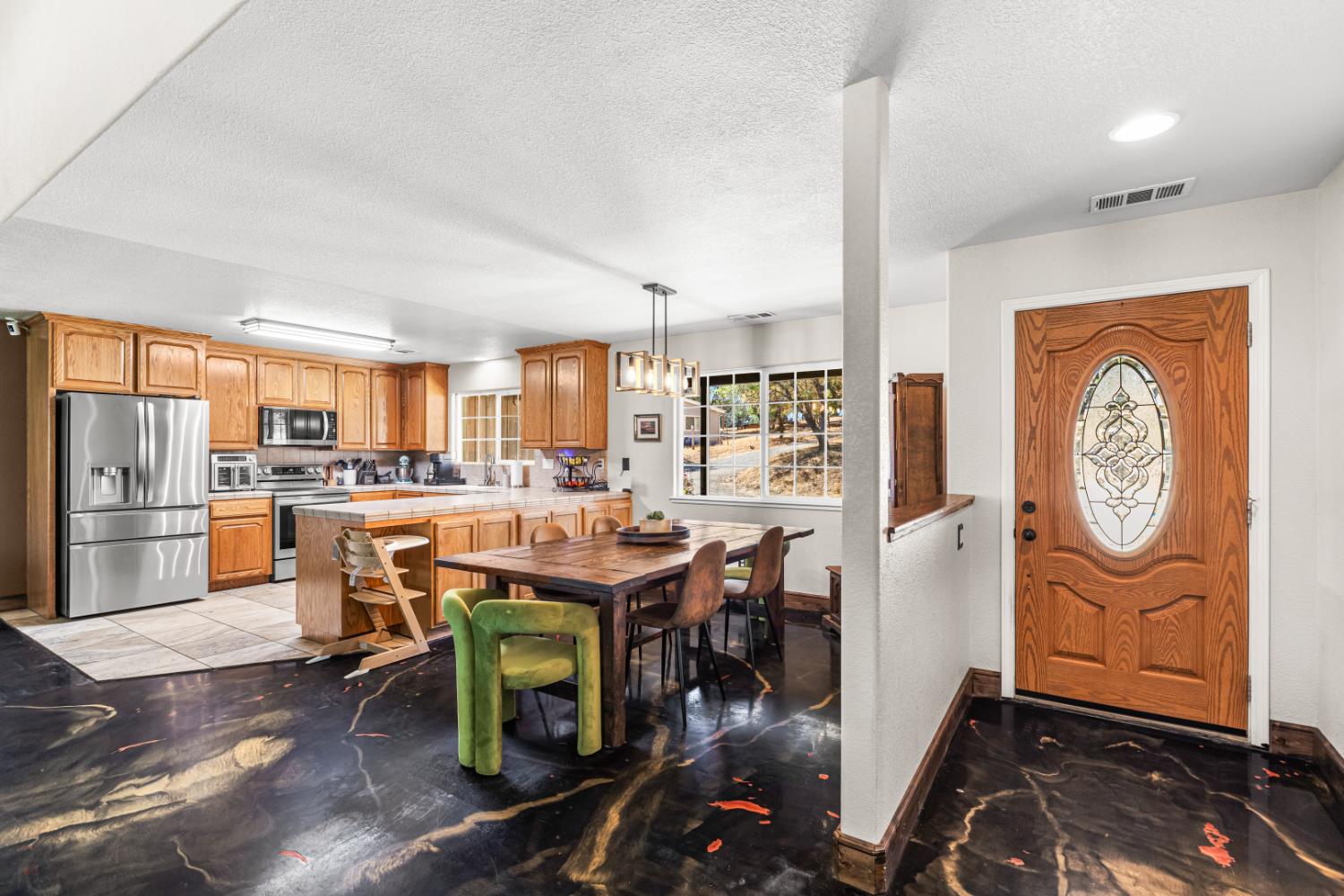 2384 Choctaw Road Copperopolis, CA 95228 - Photo 14 of 53 a view of a dining room with furniture window and wooden floor