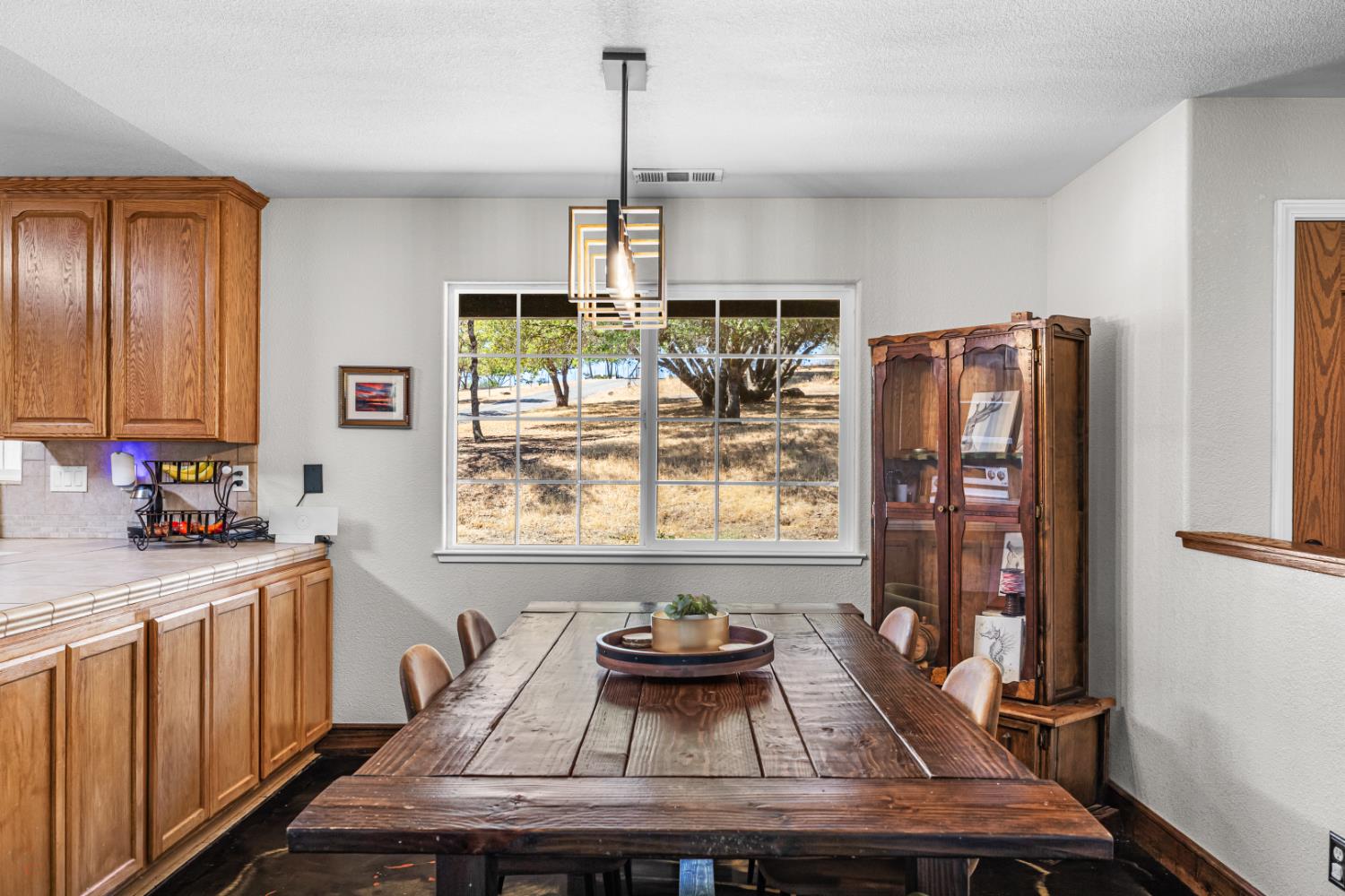 2384 Choctaw Road Copperopolis, CA 95228 - Photo 16 of 53 a kitchen with furniture a window and appliances