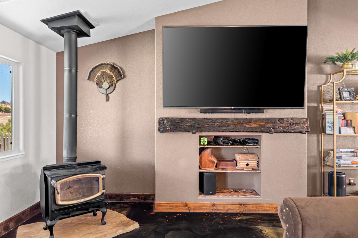 2384 Choctaw Road Copperopolis, CA 95228 - Photo 27 of 53 a living room with furniture and a flat screen tv