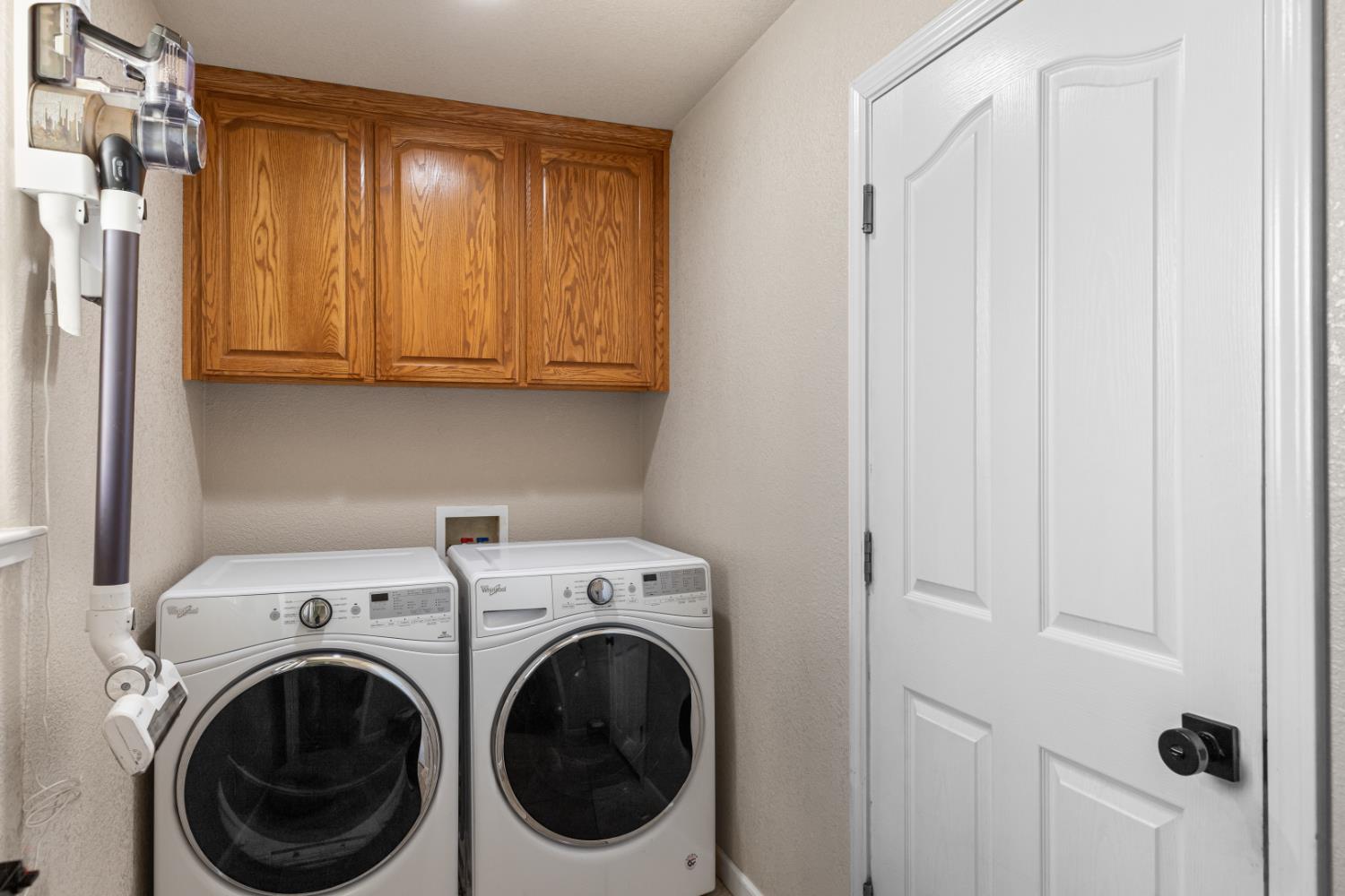 2384 Choctaw Road Copperopolis, CA 95228 - Photo 28 of 53 a view of storage and utility room with washer and dryer