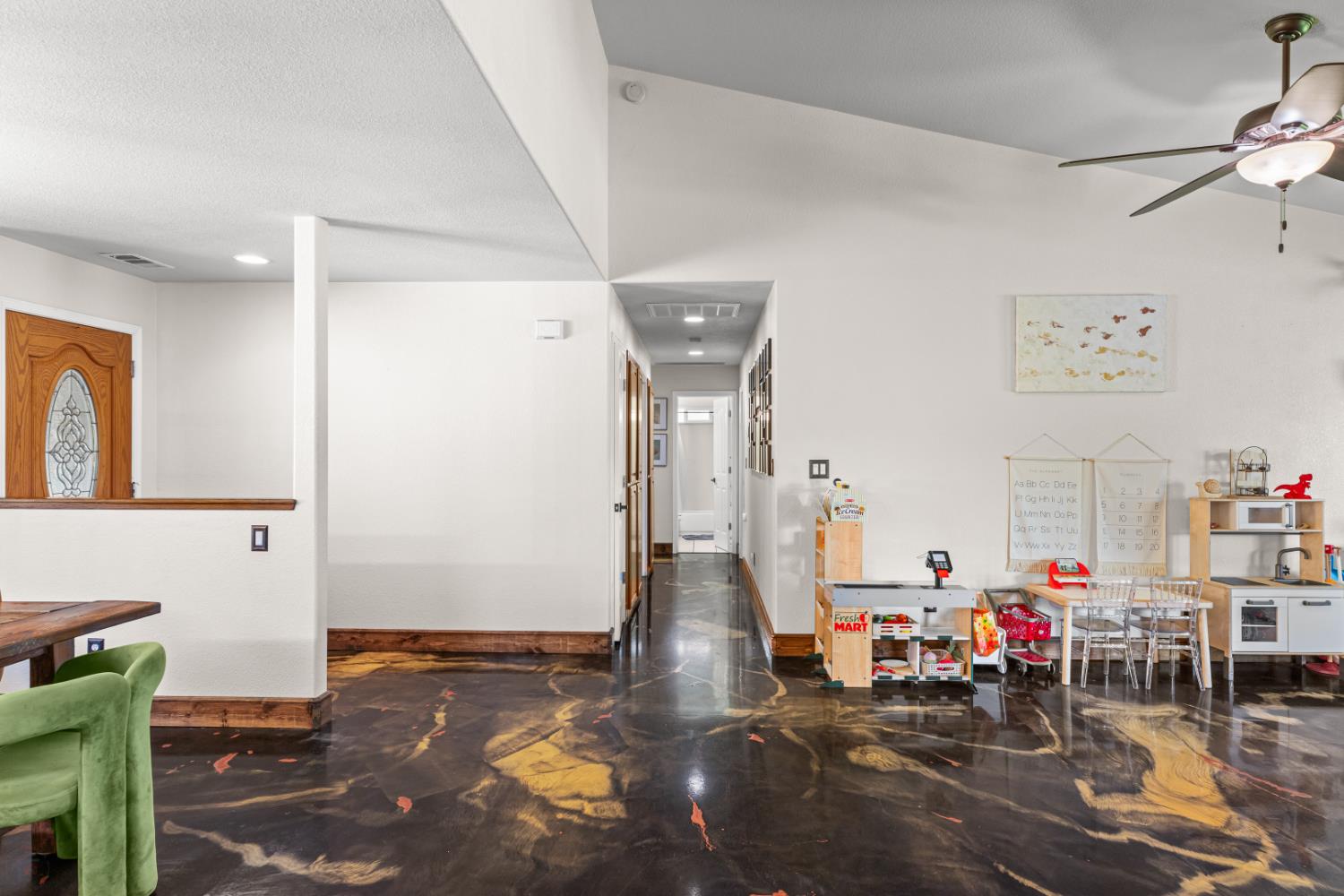 2384 Choctaw Road Copperopolis, CA 95228 - Photo 29 of 53 a living room with lots of furniture and white walls