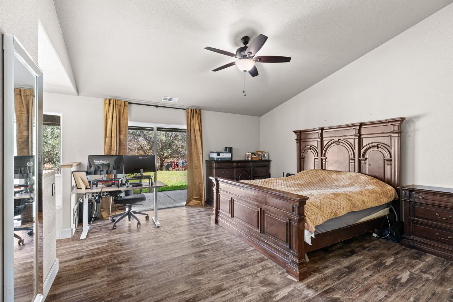 2384 Choctaw Road Copperopolis, CA 95228 - Photo 33 of 53 a bedroom with a bed a large window with table and chairs