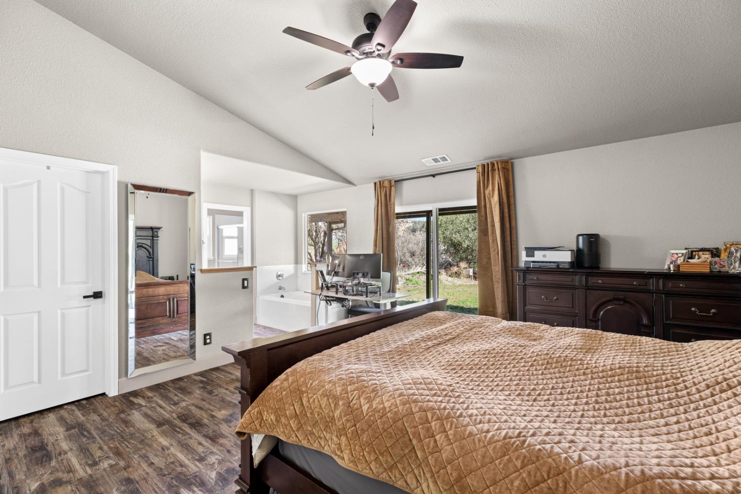 2384 Choctaw Road Copperopolis, CA 95228 - Photo 35 of 53 a bedroom with a bed and a dresser