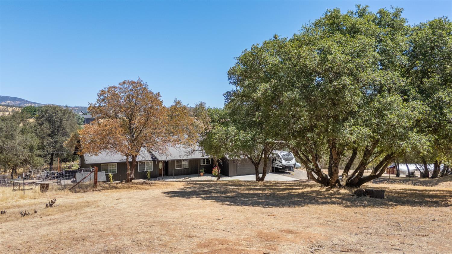 2384 Choctaw Road Copperopolis, CA 95228 - Photo 8 of 53 a view of a yard with a tree