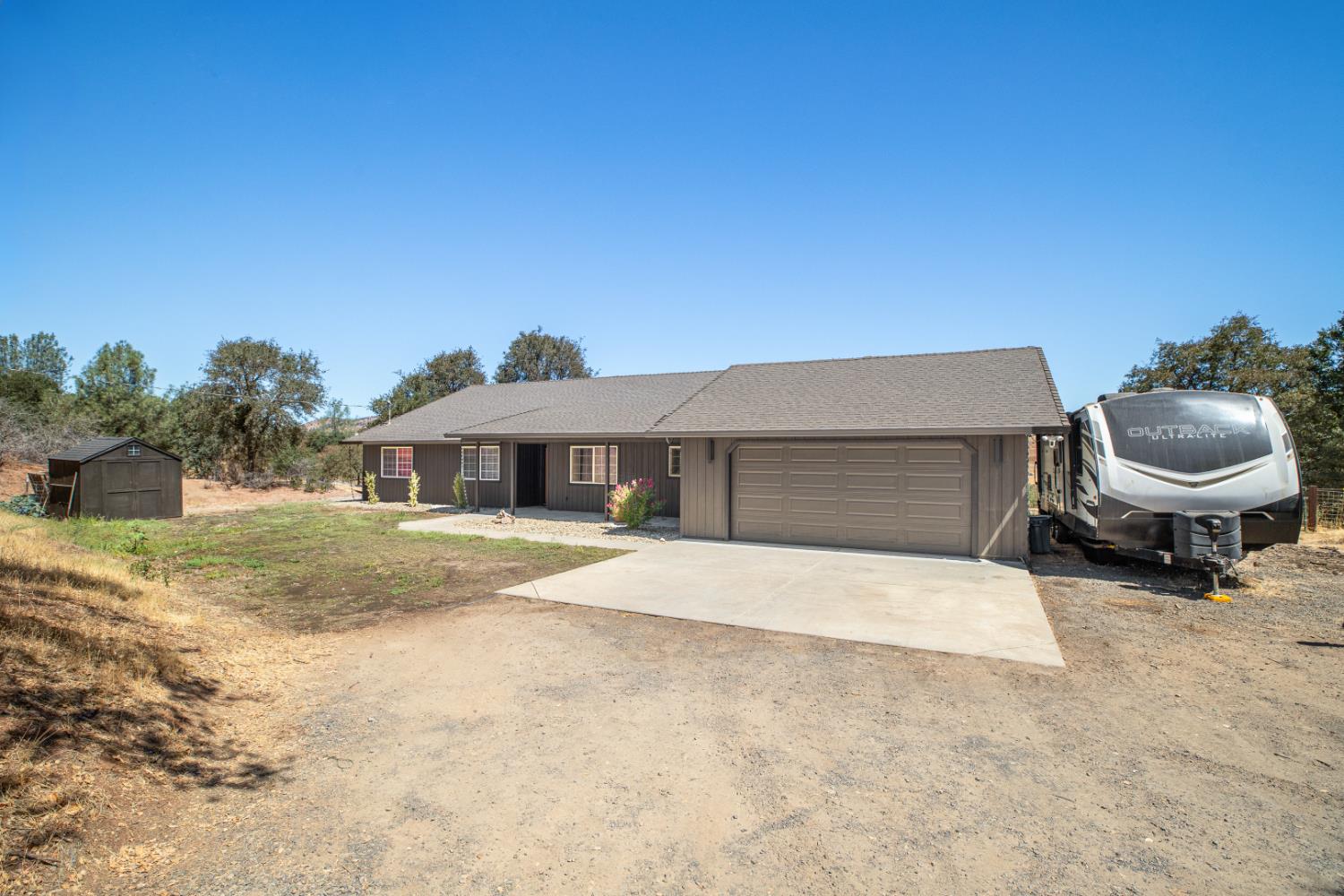 2384 Choctaw Road Copperopolis, CA 95228 - Photo 9 of 53 a front view of a house with a yard