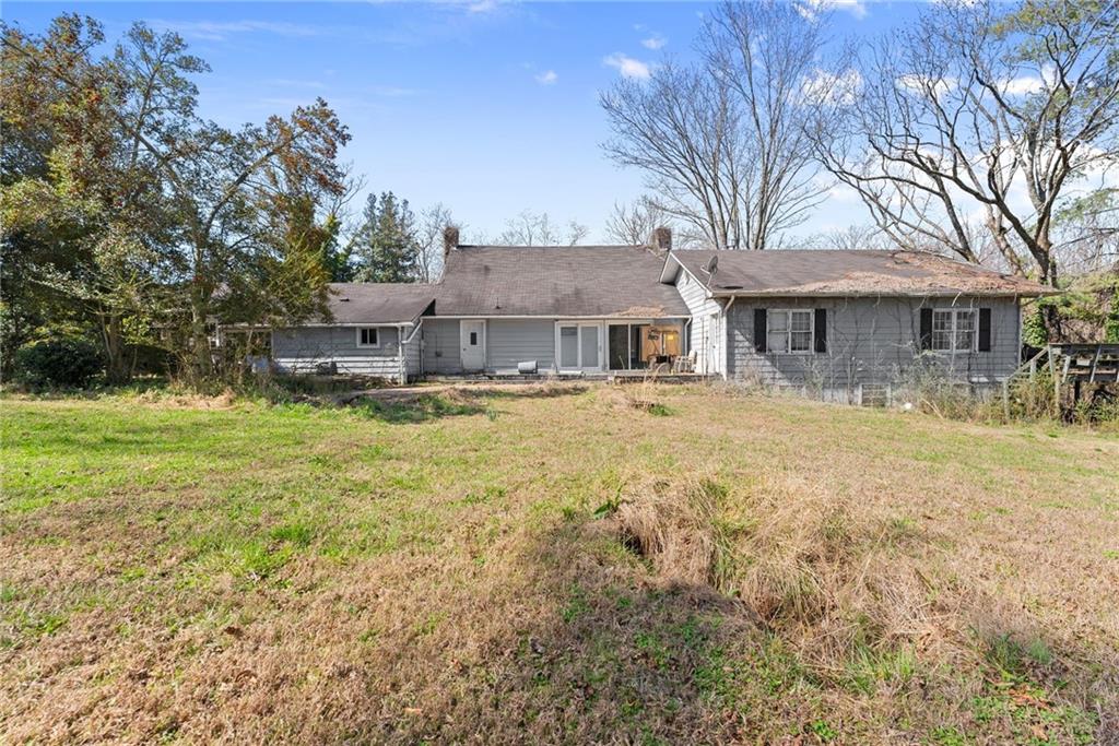 111 Skitts Mountain Road Cleveland, GA 30528 - Photo 26 of 60 a house that has a tree in front of it