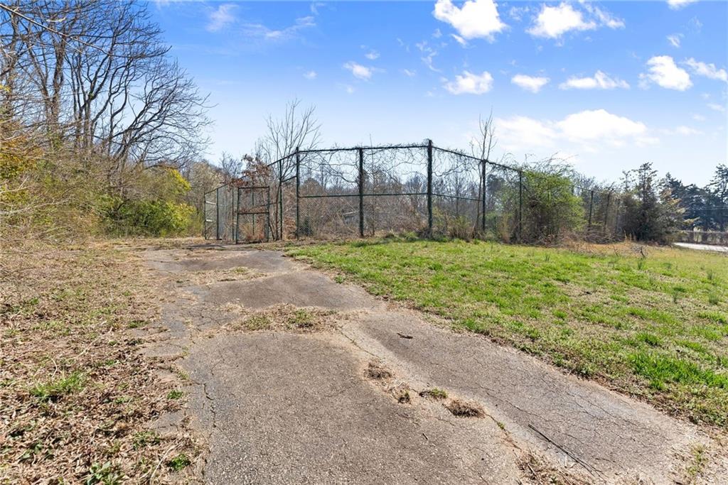 111 Skitts Mountain Road Cleveland, GA 30528 - Photo 29 of 60 a view of a backyard with large tree