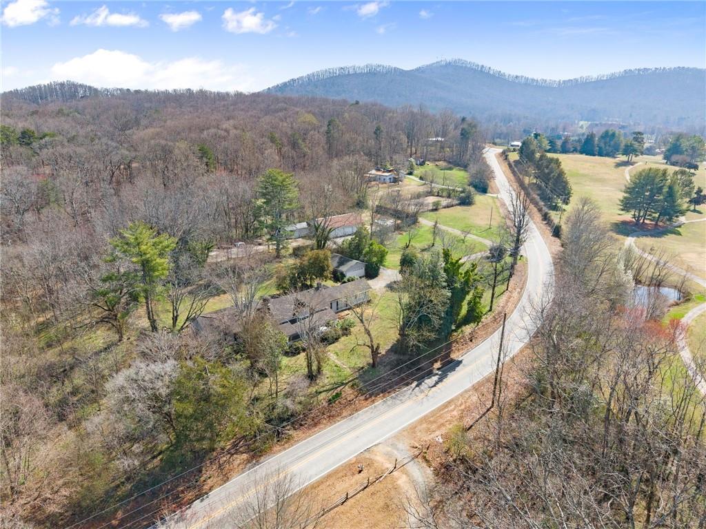 111 Skitts Mountain Road Cleveland, GA 30528 - Photo 3 of 60 a view of a lush green hillside and houses