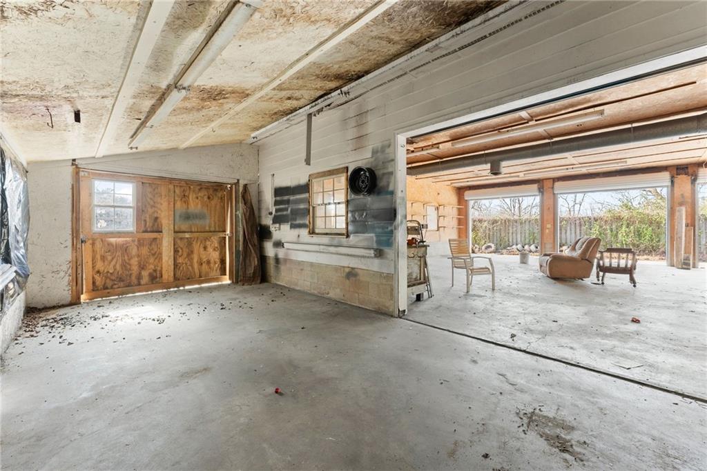 111 Skitts Mountain Road Cleveland, GA 30528 - Photo 35 of 60 a view of a hallway with wooden floor and a fireplace